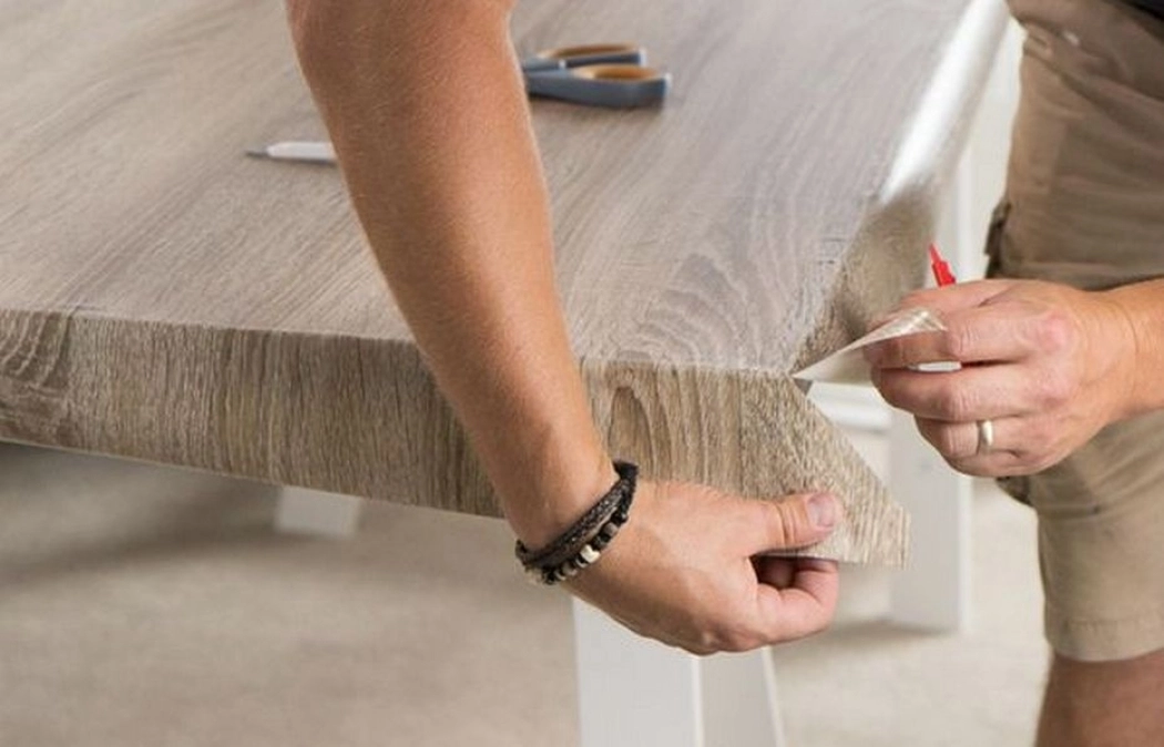 Why does the film bubble and peel off?